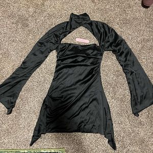 Rosedress black long sleeve dress. Brand new never worn. Can fit s/m